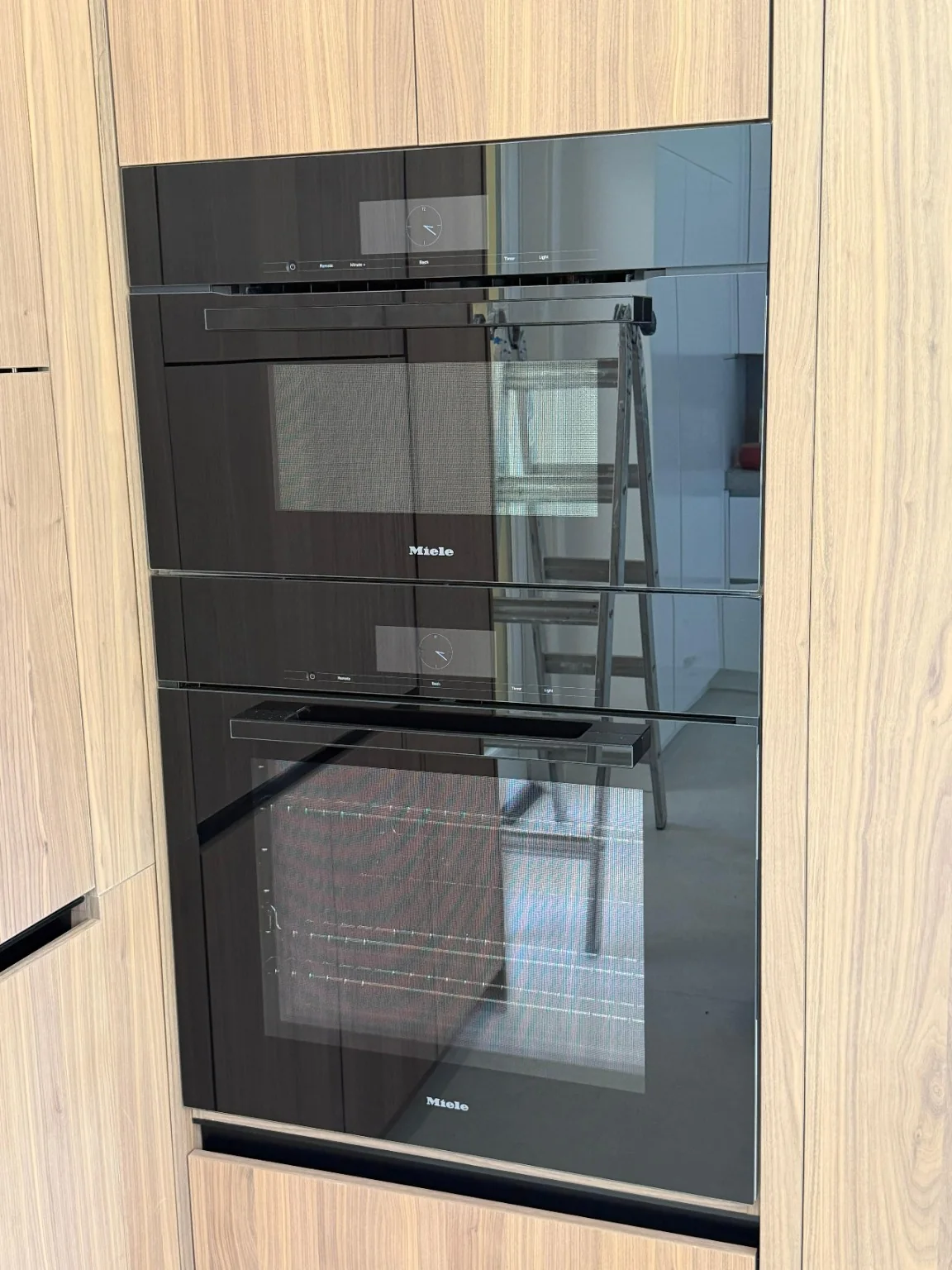 Miele double oven in a built-in kitchen installation